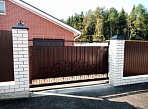 Изготовление и монтаж кованых откатных ворот и калитки для частного дома